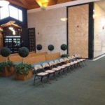 Oak Lawn Cemetery and Arboretum mausoleum set up includes chairs and decorated pews in natural lighting
